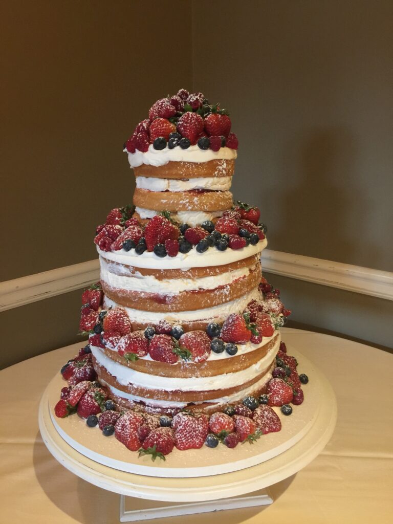 frosted pumpkin naked cake with berries for summer